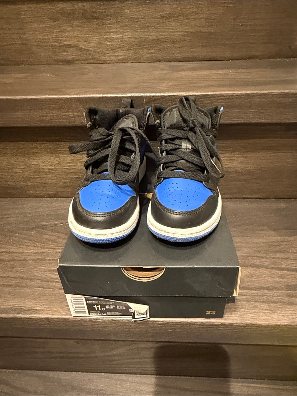Jordan 1 Mid Kids in Black and Royal Blue